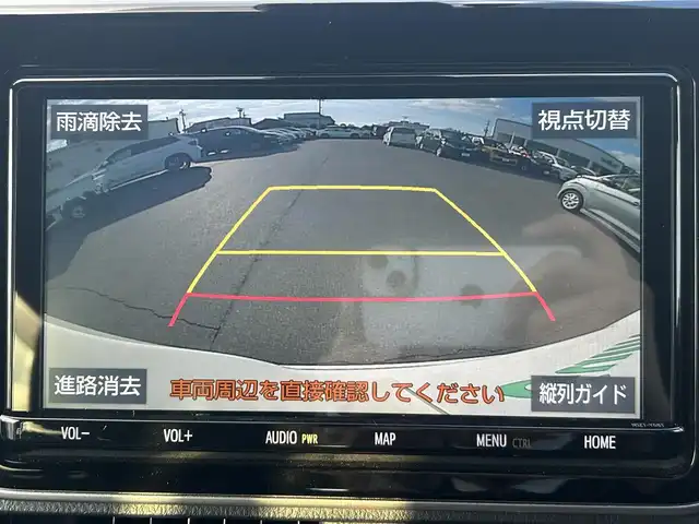 トヨタ ヴォクシー ハイブリッド ZS 煌 岡山県 2018(平30)年 9.9万km ホワイトパールクリスタルシャイン 登録時走行距離98348km/TRDエアロ/純正9インチナビ/フルセグTV(AM.FM.CD.DVD.TV.BT)/両側パワースライドドア/バックカメラ/ETC/シートヒーター/クリアランスソナー/衝突軽減ブレーキ/横滑り防止装置/クルーズコントロール/車線逸脱警報（レーンキープアシスト）/オートライト/オートマチックハイビーム/アイドリングストップ/16インチ純正AW/純正フロアマット/スペアキー/LEDヘッドライト/取扱説明書