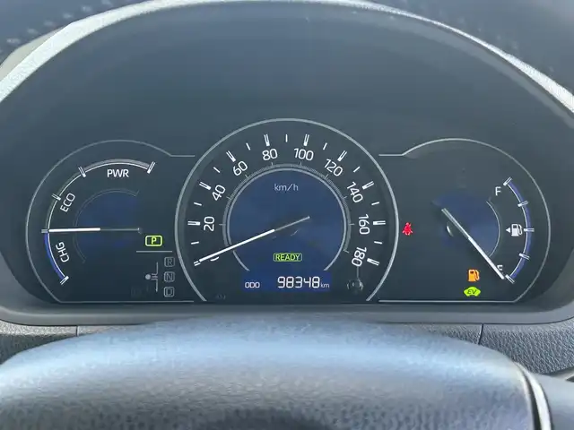 トヨタ ヴォクシー ハイブリッド ZS 煌 岡山県 2018(平30)年 9.9万km ホワイトパールクリスタルシャイン 登録時走行距離98348km/TRDエアロ/純正9インチナビ/フルセグTV(AM.FM.CD.DVD.TV.BT)/両側パワースライドドア/バックカメラ/ETC/シートヒーター/クリアランスソナー/衝突軽減ブレーキ/横滑り防止装置/クルーズコントロール/車線逸脱警報（レーンキープアシスト）/オートライト/オートマチックハイビーム/アイドリングストップ/16インチ純正AW/純正フロアマット/スペアキー/LEDヘッドライト/取扱説明書