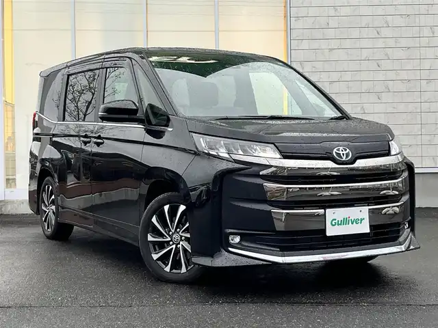 トヨタ ノア ハイブリッド S－Z 岩手県 2024(令6)年 0.7万km アティチュードブラックマイカ 純正ディスプレイ/バックカメラ/ETC/ドライブレコーダー/レーダークルーズコントロール/衝突被害軽減ブレーキ/レーンキープアシスト/横滑り防止装置/アイドリングストップ/後席モニター/シートヒーター/オートライト/オートハイビーム/LEDヘッドライト/フォグランプ/スマートキー/プッシュスタート/電動格納ミラー/純正17インチAW/純正フロアマット/純正ドアバイザー/保証書/取扱説明書