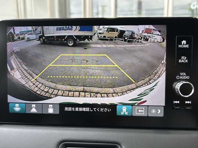 ホンダ ヴェゼル ハイブリッド e:HEV Z 静岡県 2025(令7)年 0.1万km未満 クリスタルブラックパール 純正ディスプレイオーディオ/・Bluetooth/・フルセグTV/・Apple CarPlay/・Android Auto/・USB/・AM/・FM/主要装備/・フロントグリル　ベルリナブラック/・衝突軽減/・レーンキープ/・追従クルコン/・BSM/・コーナーセンサー前後/・バックカメラ/・置くだけ充電/・パワーバックドア/・ハンドルヒーター/・シートヒーター/・ETC２．０/・LEDオートライト/・純正アルミホイール/・スマートキー/・プッシュスタート
