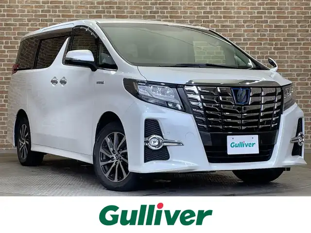 トヨタ アルファードハイブリット SR Cパッケージ 岩手県 2017(平29)年 3.7万km ホワイトパールクリスタルシャイン E-Four/本革シート/12.1型後席ディスプレイ/プリクラッシュセーフティ/レーダークルーズコントロール/クリアランスソナー/オートブレーキホールド/横滑り防止装置/MTモード付きAT/両側パワースライドドア/パワーバックドア/純正10型ナビ/フルセグTV/パワーシート/シートヒーター/ステアリングヒーター/AC100V1500Wアクセサリーコンセント/ETC/バックカメラ/リヤロールサンシェード/LEDヘッドランプ/純正17インチアルミホイール