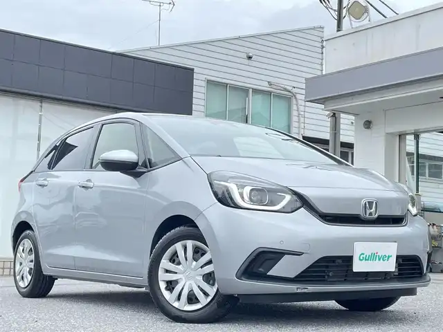 ホンダ フィット ホーム 千葉県 2020(令2)年 1.9万km ルナシルバーM ワンオーナー/Honda SENSING/・衝突軽減ブレーキ〈CMBS〉/・誤発進抑制機能/・後方誤発進抑制機能/・近距離衝突軽減ブレーキ/・歩行者事故低減ステアリング/・路外逸脱抑制機能/・渋滞追従機能付アダプティブ・クルーズ・コントロール〈ACC〉/・車線維持支援システム〈LKAS〉/・先行車発進お知らせ機能/・標識認識機能/・オートハイビーム/ハーフレザー/純正ディーラーナビ/・AM/FM/CD/BTオーディオ/ETC/LEDヘッドライト/スペアキー/保証書/取扱説明書