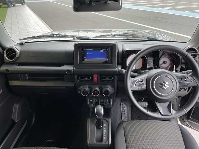 スズキ ジムニー XC 愛知県 2023(令5)年 2万km ミディアムグレー 衝突軽減システム/ディスプレイオーディオ　ナビ機能なし/４WD/バックカメラ/シートヒーター/LEDヘッドライト/ETC/レーンキープアシスト/スマートキー/プッシュスタート/ステアリングスイッチ