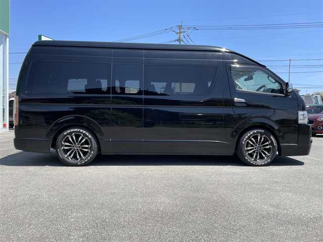 トヨタ ハイエース グランドキャビン 福岡県 2019(平31)年 1.5万km ブラック 4列10人乗り/純正ナビ(BT/CD/DVD)/フルセグTV/パワースライドドア(片側)/バックカメラ/ビルトインETC2.0/ドライブレコーダー/後席用フリップダウンモニター/ビークルスタビリティコントロール/電動格納ドアミラー/オートライト/オートエアコン/ハンドルカバー付/レザー調シートカバー付/2～4列目ベンチシート/シャレン17インチアルミホイール/スマートキー/スマートエントリー/スタートシステム