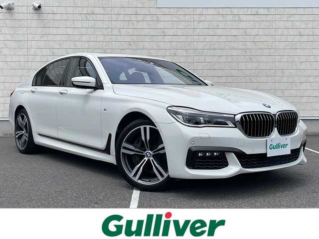 ＢＭＷ ７５０ｉ Mスポーツ 栃木県 2018(平30)年 7.6万km アルピンホワイトⅢ サンルーフ/純正10.25型ナビ/フルセグTV/サラウンドビューカメラ/アクティブクルーズコントロール/パークディスタンスコントロール/ドライビングアシストプラス/・ステアリング/レーンコントロール/・レーンディパーチャーウォーニング/・レーンチェンジウォーニング/・アクティブサイドコリジョンプロテクション/・前車接近警告機能/・衝突回避被害軽減ブレーキ/・後車衝突警報機能/・クロストラフィックウォーニング/パーキングアシスト/ツインターボ/アダプティブLEDヘッドランプ/デュアルオートエアコン/本革巻きスポーツステアリング/パドルシフト/エクスクルーシブナッパ革シート/全席シートヒーター/前席コンフォートシート/ベンチレーション/運転席パワーシート/メモリー/純正20インチアルミホイール/コンフォートアクセス/ハーマンカードンサラウンドシステム/禁煙車