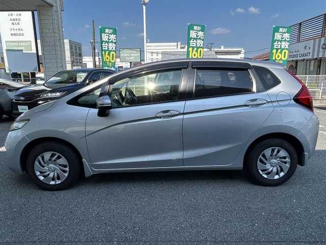 ホンダ フィット 13G Fパッケージ 奈良県 2013(平25)年 3.8万km アラバスターシルバーメタリック 純正ナビ/純正マット/ドアバイザー/スペアキー/取扱説明書/フルフラット/スマートキー/ABS