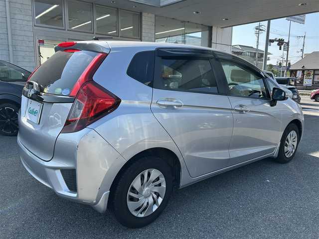 ホンダ フィット 13G Fパッケージ 奈良県 2013(平25)年 3.8万km アラバスターシルバーメタリック 純正ナビ/純正マット/ドアバイザー/スペアキー/取扱説明書/フルフラット/スマートキー/ABS