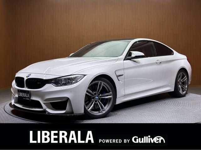 ＢＭＷ Ｍ４ クーペ 千葉県 2015(平27)年 5.3万km アルピンホワイトⅢ 赤革シート　/クルーズコントロール　/HUD　/ナビ　/TV　/Bカメラ　/Bluetooth接続　/電動シート　/シートH　/コンフォートアクセス　/PDC　/LEDライト　/衝突軽減B　/LAK　/ETC　/カーボンFリップスポイラー /トランクスポイラー
