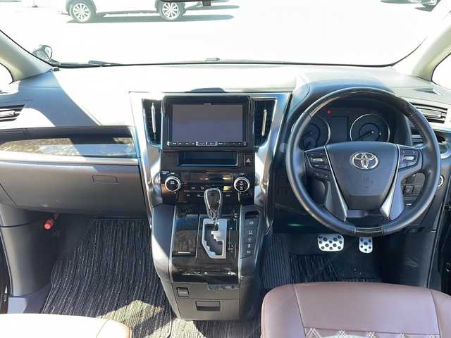 トヨタ ヴェルファイア Z 岩手県 2016(平28)年 3.4万km ブラック 社外SDナビ/AM/FM/CD/DVD/Bluetooth/フルセグTV/バックカメラ/ETC/両側パワースライドドア/フリップダウンモニター/衝突被害軽減ブレーキ/横滑り防止装置/コーナーセンサー/アイドリングストップ/オートライト/LEDヘッドライト/フォグランプ/スマートキー/プッシュスタート/電動格納ミラー/純正18インチAW/純正フロアマット/ドアバイザー