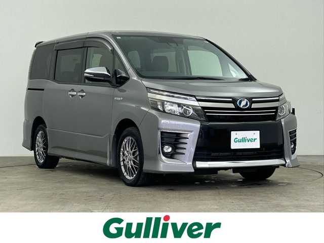 トヨタ ヴォクシー ハイブリッド ZS 煌Ⅱ 千葉県 2017(平29)年 2.9万km アイスチタニウムマイカメタリック 禁煙車/ワンオーナー/トヨタセーフティセンス/・先行車発進お知らせシステム/・レーンディパーチャーアラート/・クリアランスソナー/両側電動ドア/純正７インチメモリナビ/・型番：NSZT-W66T/・CD/DVD/Bluetooth/フルセグTV/・バックカメラ/・ビルトインETC２.０/革巻きステアリング/・ステアリングスイッチ/左右独立エアコン/社外フロアマット/純正１６インチAW/オートライト/・オートマチックハイビーム/・LEDヘッドライト/・LEDフォグランプ