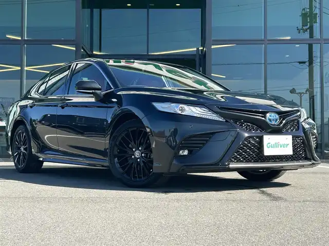 トヨタ カムリ WS ブラックエディション 愛媛県 2020(令2)年 6.8万km プレシャスブラックパール 純正8型ディスプレイオーディオ(フルセグTV/Bluetooth)/バックカメラ/赤レザーシート/前席シートヒーター/パワーシート/トヨタセーフティセンス/衝突被害軽減装置/車線逸脱防止装置/レーダークルーズコントロール/ブラインドスポットモニター/クリアランスソナー/100V/1500Wコンセント/USB入力端子/パドルシフト/ステアリングリモコン/電格ミラー/ヒートミラー/電動パーキングブレーキ/AutoHold機能/シガーソケット/現状サマー(純正AW)(235/45/R18)/DUNLOP LE MANS V＋/禁煙車