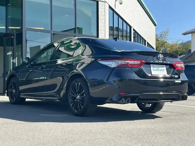 トヨタ カムリ WS ブラックエディション 愛媛県 2020(令2)年 6.8万km プレシャスブラックパール 純正8型ディスプレイオーディオ(フルセグTV/Bluetooth)/バックカメラ/赤レザーシート/前席シートヒーター/パワーシート/トヨタセーフティセンス/衝突被害軽減装置/車線逸脱防止装置/レーダークルーズコントロール/ブラインドスポットモニター/クリアランスソナー/100V/1500Wコンセント/USB入力端子/パドルシフト/ステアリングリモコン/電格ミラー/ヒートミラー/電動パーキングブレーキ/AutoHold機能/シガーソケット/現状サマー(純正AW)(235/45/R18)/DUNLOP LE MANS V＋/禁煙車