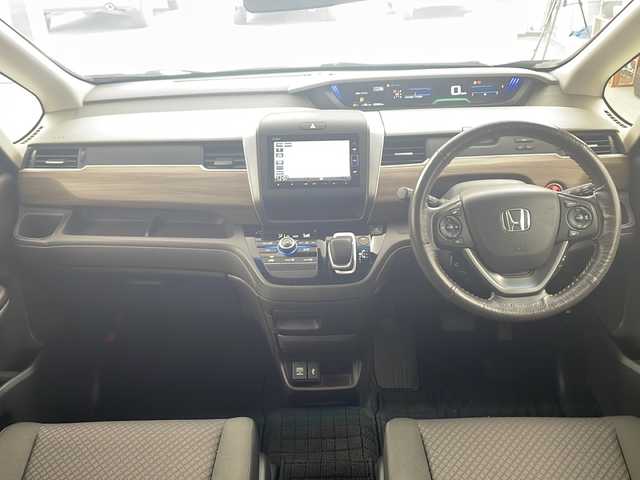 ホンダ フリード ハイブリット G ホンダセンシング 兵庫県 2020(令2)年 5.4万km クリスタルブラックパール ●Honda SENSING/・衝突軽減ブレーキ/・車線逸脱警報/・誤発進抑制機能/・先行車発進お知らせ/・アダプティブブクルーズコントロール/・純正ナビ＆フルセグ＆BT＆DVD/・バックカメラ/・両側パワースライドドア/・LEDヘッドライト＋LEDアクティブコーナリングライト/・運転席用i-SRSエアバッグシステム＆助手席用i-SRSエアバッグシステム/・オートリトラミラー/・社外15インチアルミホイール/・ビルトインETC/・スマートキー/・プッシュスタート/・純正フロアマット/・横滑り防止装置