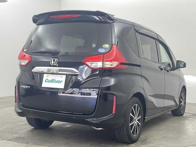 ホンダ フリード ハイブリット G ホンダセンシング 兵庫県 2020(令2)年 5.4万km クリスタルブラックパール ●Honda SENSING/・衝突軽減ブレーキ/・車線逸脱警報/・誤発進抑制機能/・先行車発進お知らせ/・アダプティブブクルーズコントロール/・純正ナビ＆フルセグ＆BT＆DVD/・バックカメラ/・両側パワースライドドア/・LEDヘッドライト＋LEDアクティブコーナリングライト/・運転席用i-SRSエアバッグシステム＆助手席用i-SRSエアバッグシステム/・オートリトラミラー/・社外15インチアルミホイール/・ビルトインETC/・スマートキー/・プッシュスタート/・純正フロアマット/・横滑り防止装置