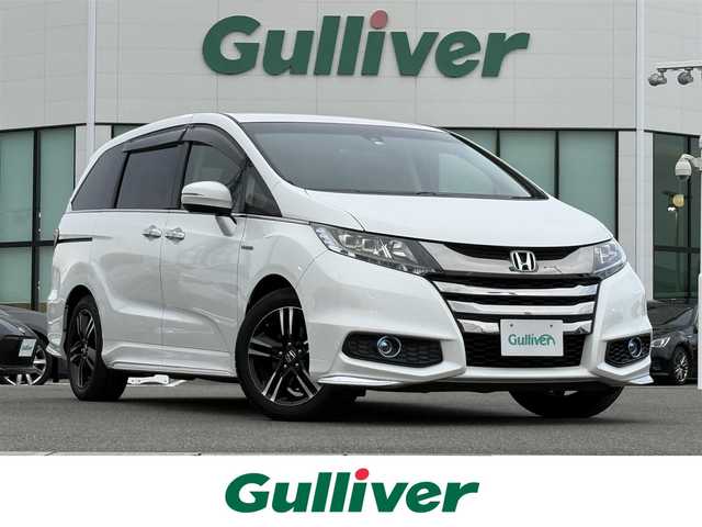 ホンダ オデッセイ ハイブリッド アブソルートセンシングEXパック 佐賀県 2016(平28)年 7.9万km ホワイトオーキッドパール 純正SDナビ(フルセグTV/CD/DVD/BT)/バックカメラ/ホンダセンシング/レーダークルーズコントロール/両側パワースライドドア/オットマン/USBポート/ETC/100V電源/ブラインドスポットモニター/純正フロアマット/純正LEDヘッドライト/純正17インチアルミホイール