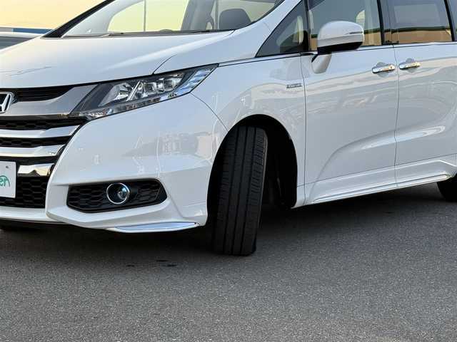 ホンダ オデッセイ ハイブリッド アブソルートセンシングEXパック 佐賀県 2016(平28)年 7.9万km ホワイトオーキッドパール 純正SDナビ(フルセグTV/CD/DVD/BT)/バックカメラ/ホンダセンシング/レーダークルーズコントロール/両側パワースライドドア/オットマン/USBポート/ETC/100V電源/ブラインドスポットモニター/純正フロアマット/純正LEDヘッドライト/純正17インチアルミホイール
