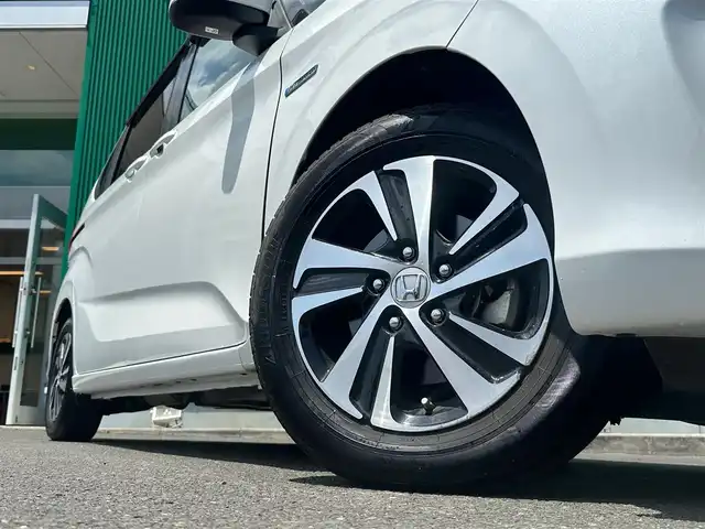 ホンダ フリード ハイブリット EX 宮城県 2018(平30)年 5.9万km ホワイトオーキッドパール Sパッケージ/●本革巻ステアリングホイール/●コンビシート&専用インテリア/●15インチアルミホイール/●シートバックアッパーポケット/Cパッケージ/●プラズマクラスター技術搭載フルオート・エアコンディショナー/●ロールサンシェイド/●コンフォートビューパッケージ/（親水/ヒーテッドドアミラー＋熱線入りフロントウインドウ＋フロントドア撥水ガラス）/ホンダセンシング/●衝突軽減ブレーキ〈CMBS〉/●誤発進抑制機能/●ACC〈アダプティブ・クルーズ・コントロール〉/●LKAS〈車線維持支援システム〉/●歩行者事故低減ステアリング/●路外逸脱抑制機能/●先行車発進お知らせ機能/●標識認識機能/純正9インチナビ（VXM-187VFNi）/・CD/DVD/・Bluetooth/・フルセグTV/バックカメラ/ビルトインETC/両側パワースライドドア/シートヒーター/LEDヘッドライト＋アクティブコーナリングライト/スマートキー＆プッシュスタート/スペアキー1本/電動格納ミラー/フロアマット/ドアバイザー/W/サイド/カーテンエアバッグ