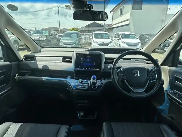 ホンダ フリード ハイブリット EX 宮城県 2018(平30)年 5.9万km ホワイトオーキッドパール Sパッケージ/●本革巻ステアリングホイール/●コンビシート&専用インテリア/●15インチアルミホイール/●シートバックアッパーポケット/Cパッケージ/●プラズマクラスター技術搭載フルオート・エアコンディショナー/●ロールサンシェイド/●コンフォートビューパッケージ/（親水/ヒーテッドドアミラー＋熱線入りフロントウインドウ＋フロントドア撥水ガラス）/ホンダセンシング/●衝突軽減ブレーキ〈CMBS〉/●誤発進抑制機能/●ACC〈アダプティブ・クルーズ・コントロール〉/●LKAS〈車線維持支援システム〉/●歩行者事故低減ステアリング/●路外逸脱抑制機能/●先行車発進お知らせ機能/●標識認識機能/純正9インチナビ（VXM-187VFNi）/・CD/DVD/・Bluetooth/・フルセグTV/バックカメラ/ビルトインETC/両側パワースライドドア/シートヒーター/LEDヘッドライト＋アクティブコーナリングライト/スマートキー＆プッシュスタート/スペアキー1本/電動格納ミラー/フロアマット/ドアバイザー/W/サイド/カーテンエアバッグ