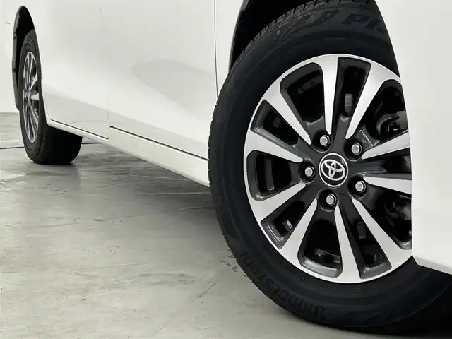 トヨタ エスクァイア ハイブリッド Gi プレミアムパッケージ 福岡県 2020(令2)年 7.6万km ホワイトパールクリスタルシャイン 後席モニター　/純正９型ナビ　/バックカメラ　/ＥＴＣ２．０　/前後ドラレコ　/クルーズコントロール　/衝突被害軽減ブレーキ　/レーンキープ　/ＰＫＳＢ　/ブラウンハーフレザー　/両側電動スライドドア　/シートヒーター