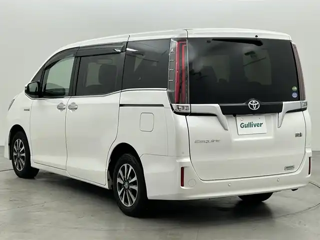 トヨタ エスクァイア ハイブリッド Gi プレミアムパッケージ 福岡県 2020(令2)年 7.6万km ホワイトパールクリスタルシャイン 後席モニター　/純正９型ナビ　/バックカメラ　/ＥＴＣ２．０　/前後ドラレコ　/クルーズコントロール　/衝突被害軽減ブレーキ　/レーンキープ　/ＰＫＳＢ　/ブラウンハーフレザー　/両側電動スライドドア　/シートヒーター