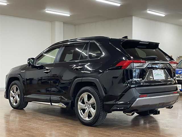 トヨタ ＲＡＶ４ ハイブリッドG 道央・札幌 2020(令2)年 9.4万km アティチュードブラックマイカ 4WD/全周モデリスタエアロ/純正SDナビ/・フルセグTV/CD/DVD/BT/SD/USB/バックカメラ/TVキャンセラー/社外前後ドライブレコーダー/合成皮革シート/前席シートヒーター/運転席パワーシート/運転席シートメモリ機能/電動パーキングブレーキ/ブレーキホールド/パワーバックドア/トヨタセーフティセンス/・プリクラッシュセーフティ/・レーントレーシングアシスト/・ロードサインアシスト/・緊急時操舵支援機能/・低速時加速制御機能/・先行車発進告知機能/横滑り防止装置/前後コーナーセンサー/ステアリングヒーター/レーダークルーズコントロール/ブラインドスポットモニター/ビルトインETC/プッシュスタート/スマートキー/スペアキー/オートライト/オートマチックハイビーム/AC100V電源/純正フロアマット/純正ドアバイザー/ウインカーミラー/ルーフレール/純正18インチAW/ヒッチメンバー/積込社外18インチAW付きサマータイヤ/・225/50R18 ’22製 4mm/新車時保証書/取扱説明書