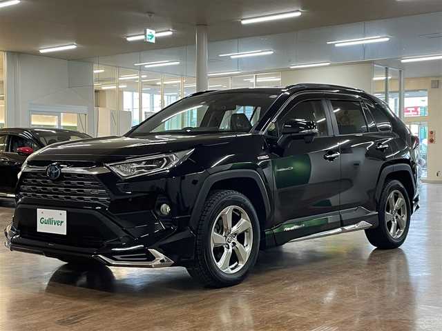 トヨタ ＲＡＶ４ ハイブリッドG 道央・札幌 2020(令2)年 9.4万km アティチュードブラックマイカ 4WD/全周モデリスタエアロ/純正SDナビ/・フルセグTV/CD/DVD/BT/SD/USB/バックカメラ/TVキャンセラー/社外前後ドライブレコーダー/合成皮革シート/前席シートヒーター/運転席パワーシート/運転席シートメモリ機能/電動パーキングブレーキ/ブレーキホールド/パワーバックドア/トヨタセーフティセンス/・プリクラッシュセーフティ/・レーントレーシングアシスト/・ロードサインアシスト/・緊急時操舵支援機能/・低速時加速制御機能/・先行車発進告知機能/横滑り防止装置/前後コーナーセンサー/ステアリングヒーター/レーダークルーズコントロール/ブラインドスポットモニター/ビルトインETC/プッシュスタート/スマートキー/スペアキー/オートライト/オートマチックハイビーム/AC100V電源/純正フロアマット/純正ドアバイザー/ウインカーミラー/ルーフレール/純正18インチAW/ヒッチメンバー/積込社外18インチAW付きサマータイヤ/・225/50R18 ’22製 4mm/新車時保証書/取扱説明書