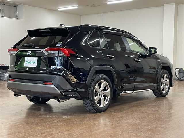 トヨタ ＲＡＶ４ ハイブリッドG 道央・札幌 2020(令2)年 9.4万km アティチュードブラックマイカ 4WD/全周モデリスタエアロ/純正SDナビ/・フルセグTV/CD/DVD/BT/SD/USB/バックカメラ/TVキャンセラー/社外前後ドライブレコーダー/合成皮革シート/前席シートヒーター/運転席パワーシート/運転席シートメモリ機能/電動パーキングブレーキ/ブレーキホールド/パワーバックドア/トヨタセーフティセンス/・プリクラッシュセーフティ/・レーントレーシングアシスト/・ロードサインアシスト/・緊急時操舵支援機能/・低速時加速制御機能/・先行車発進告知機能/横滑り防止装置/前後コーナーセンサー/ステアリングヒーター/レーダークルーズコントロール/ブラインドスポットモニター/ビルトインETC/プッシュスタート/スマートキー/スペアキー/オートライト/オートマチックハイビーム/AC100V電源/純正フロアマット/純正ドアバイザー/ウインカーミラー/ルーフレール/純正18インチAW/ヒッチメンバー/積込社外18インチAW付きサマータイヤ/・225/50R18 ’22製 4mm/新車時保証書/取扱説明書