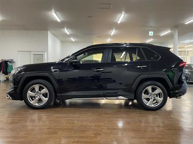 トヨタ ＲＡＶ４ ハイブリッドG 道央・札幌 2020(令2)年 9.4万km アティチュードブラックマイカ 4WD/全周モデリスタエアロ/純正SDナビ/・フルセグTV/CD/DVD/BT/SD/USB/バックカメラ/TVキャンセラー/社外前後ドライブレコーダー/合成皮革シート/前席シートヒーター/運転席パワーシート/運転席シートメモリ機能/電動パーキングブレーキ/ブレーキホールド/パワーバックドア/トヨタセーフティセンス/・プリクラッシュセーフティ/・レーントレーシングアシスト/・ロードサインアシスト/・緊急時操舵支援機能/・低速時加速制御機能/・先行車発進告知機能/横滑り防止装置/前後コーナーセンサー/ステアリングヒーター/レーダークルーズコントロール/ブラインドスポットモニター/ビルトインETC/プッシュスタート/スマートキー/スペアキー/オートライト/オートマチックハイビーム/AC100V電源/純正フロアマット/純正ドアバイザー/ウインカーミラー/ルーフレール/純正18インチAW/ヒッチメンバー/積込社外18インチAW付きサマータイヤ/・225/50R18 ’22製 4mm/新車時保証書/取扱説明書