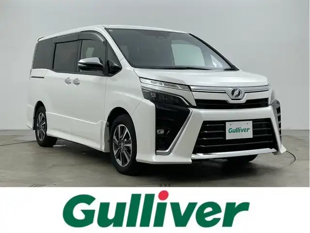 トヨタ ヴォクシー ZS 煌Ⅱ 岡山県 2020(令2)年 3.9万km ホワイトパールクリスタルシャイン 純正10インチナビ　/【Bluetooth/フルセグTV/CD/DVD/HDMI接続/USB接続】/型番:NSZN-Z68T/純正12.1インチフリップダウンモニター　/両側パワースライドドア　/ビルトインＥＴＣ2.0/ＬＥＤヘッドライト　/クルーズコントロール　/純正ドライブレコーダー（前）/バックカメラ　/オートハイビーム　/コーナーセンサー（前後）/フォグライト/衝突軽減ブレーキ/アイドリングストップ