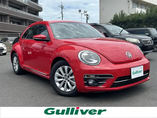 フォルクスワーゲン ザ・ビートル デザイン 島根県 2016(平28)年 3.1万km トルネードレッド 純正SDナビ/Bluetooth/フルセグテレビ/DVD再生/クルーズコントロール/ブラインドスポットディテクション/HIDオートライト/自動防眩ミラー/ミラーヒーター/純正１６インチアルミホイール/純正フロアマット/横滑り防止装置/プッシュスタート