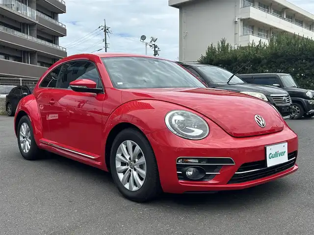 フォルクスワーゲン ザ・ビートル デザイン 島根県 2016(平28)年 3.1万km トルネードレッド 純正SDナビ/Bluetooth/フルセグテレビ/DVD再生/クルーズコントロール/ブラインドスポットディテクション/HIDオートライト/自動防眩ミラー/ミラーヒーター/純正１６インチアルミホイール/純正フロアマット/横滑り防止装置/プッシュスタート