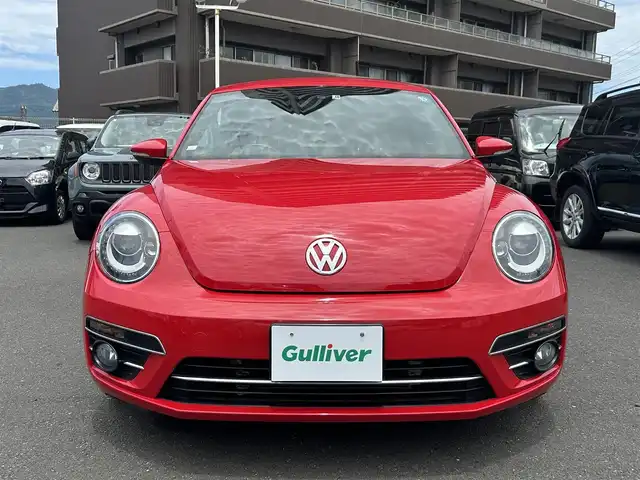 フォルクスワーゲン ザ・ビートル デザイン 島根県 2016(平28)年 3.1万km トルネードレッド 純正SDナビ/Bluetooth/フルセグテレビ/DVD再生/クルーズコントロール/ブラインドスポットディテクション/HIDオートライト/自動防眩ミラー/ミラーヒーター/純正１６インチアルミホイール/純正フロアマット/横滑り防止装置/プッシュスタート