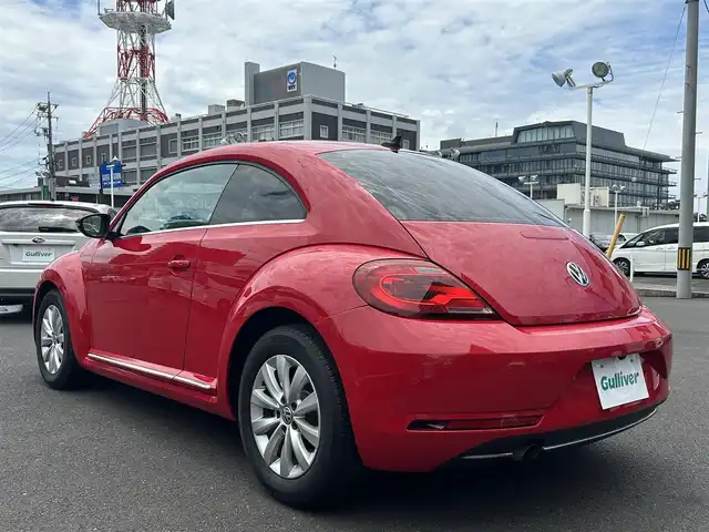 フォルクスワーゲン ザ・ビートル デザイン 島根県 2016(平28)年 3.1万km トルネードレッド 純正SDナビ/Bluetooth/フルセグテレビ/DVD再生/クルーズコントロール/ブラインドスポットディテクション/HIDオートライト/自動防眩ミラー/ミラーヒーター/純正１６インチアルミホイール/純正フロアマット/横滑り防止装置/プッシュスタート