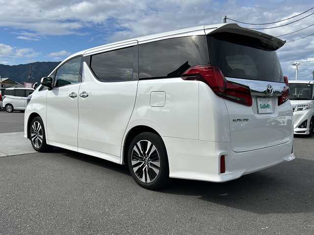 トヨタ アルファード 山梨県 2021(令3)年 3.2万km ホワイトパールクリスタルシャイン 純正ディスプレイオーディオ/BT/フルセグTV/CD/DVD/バックカメラ/フリップダウンモニター/両側パワースライドドア/純正フロアマット/コーナーセンサー前後/純正アルミホイール/前席パワーシート/シートヒーター/シートクーラー/レーダークルーズコントロール/ETC2.0/スマートキー/オットマン/電動リアゲート/レザーシート