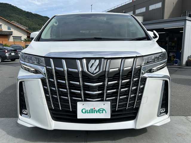 トヨタ アルファード 山梨県 2021(令3)年 3.2万km ホワイトパールクリスタルシャイン 純正ディスプレイオーディオ/BT/フルセグTV/CD/DVD/バックカメラ/フリップダウンモニター/両側パワースライドドア/純正フロアマット/コーナーセンサー前後/純正アルミホイール/前席パワーシート/シートヒーター/シートクーラー/レーダークルーズコントロール/ETC2.0/スマートキー/オットマン/電動リアゲート/レザーシート