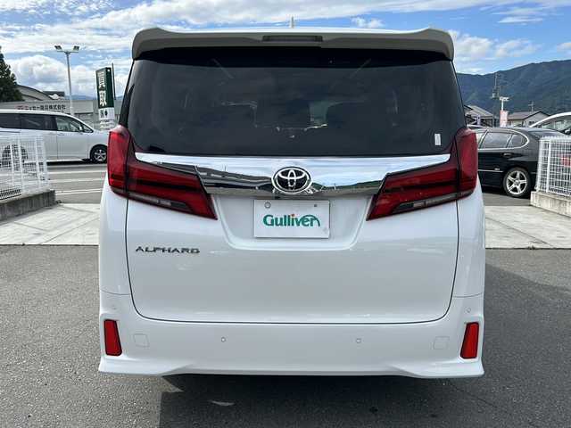 トヨタ アルファード 山梨県 2021(令3)年 3.2万km ホワイトパールクリスタルシャイン 純正ディスプレイオーディオ/BT/フルセグTV/CD/DVD/バックカメラ/フリップダウンモニター/両側パワースライドドア/純正フロアマット/コーナーセンサー前後/純正アルミホイール/前席パワーシート/シートヒーター/シートクーラー/レーダークルーズコントロール/ETC2.0/スマートキー/オットマン/電動リアゲート/レザーシート