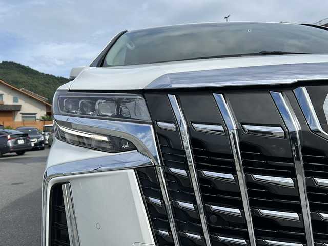 トヨタ アルファード 山梨県 2021(令3)年 3.2万km ホワイトパールクリスタルシャイン 純正ディスプレイオーディオ/BT/フルセグTV/CD/DVD/バックカメラ/フリップダウンモニター/両側パワースライドドア/純正フロアマット/コーナーセンサー前後/純正アルミホイール/前席パワーシート/シートヒーター/シートクーラー/レーダークルーズコントロール/ETC2.0/スマートキー/オットマン/電動リアゲート/レザーシート