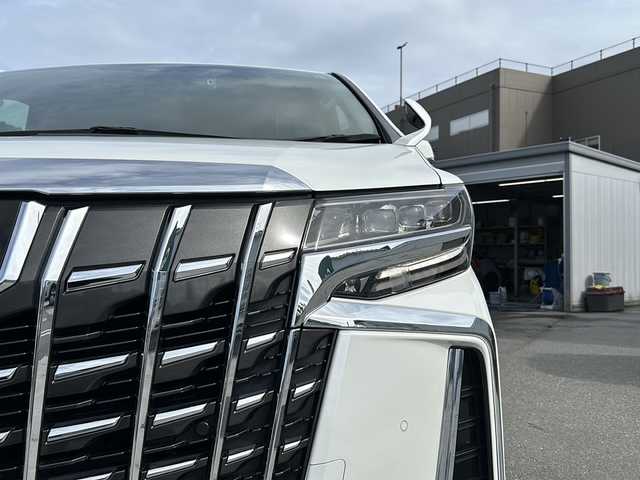 トヨタ アルファード 山梨県 2021(令3)年 3.2万km ホワイトパールクリスタルシャイン 純正ディスプレイオーディオ/BT/フルセグTV/CD/DVD/バックカメラ/フリップダウンモニター/両側パワースライドドア/純正フロアマット/コーナーセンサー前後/純正アルミホイール/前席パワーシート/シートヒーター/シートクーラー/レーダークルーズコントロール/ETC2.0/スマートキー/オットマン/電動リアゲート/レザーシート