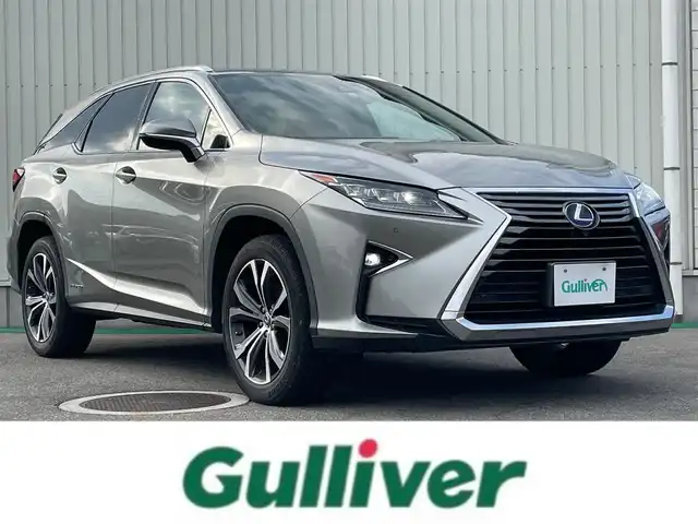 レクサス ＲＸ 450hL 富山県 2017(平29)年 5.1万km ソニックチタニウム 〇純正ナビ/〇フルセグTV/〇バックカメラ/〇ビルトインETC2.0/〇ドライブレコーダー/〇レーダークルーズコントロール/〇LEDヘッドランプ/〇LEDフォグランプ/〇純正20インチアルミ/〇革巻きステアリング/〇ステアリングヒーター/〇デュアルエアコン/〇革シート/〇シートヒーター/〇パワーシート/〇ムーンルーフ/〇ルーフレール/〇パノラミックビューモニター/〇セーフティシステムプラス/〇禁煙車