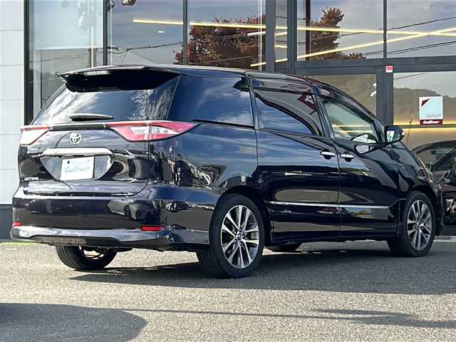 トヨタ エスティマ アエラス プレミアム G 大阪府 2017(平29)年 7.7万km スパークリングブラックパールクリスタルシャイン 衝突軽減システム　両側パワースライドドア　９型純正ナビ　フルセグＴＶ　ＣＤ　ＤＶＤ　Bluetooth　ＨＤＭＩ　バックカメラ　１２．１型純正フリップダウンモニター　ハーフレザーシート　前席シートヒーター　運転席パワーシート　ＥＴＣ　7人乗り　パワーバックドア　クルーズコントロール　コンビハンドル　ドライブレコーダー　AC100V充電　プッシュスタート　スマートキー　スペアキー　取扱説明書　保証書　