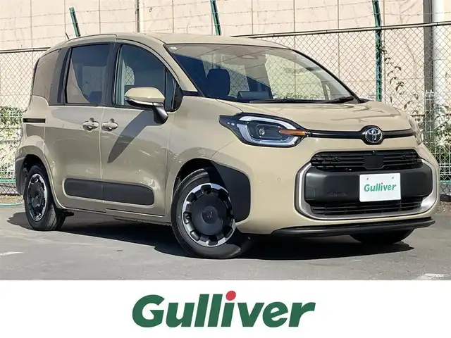 トヨタ シエンタ ハイブリッド Z 東京都 2025(令7)年 0.8万km ベージュ 純正ナビ/・フルセグTV　Bluetooth　USB/全周囲カメラ　/両側電動スライドドア　/ドライブレコーダー　/純正フロアマット　/ＢＳＭ　/ＥＴＣ　/オートＨＶ　/コーナーセンサー　/ＬＥＤヘッドライト　　/衝突被害軽減システム　/ABS/横滑り防止装置/レーンアシスト/オートライト