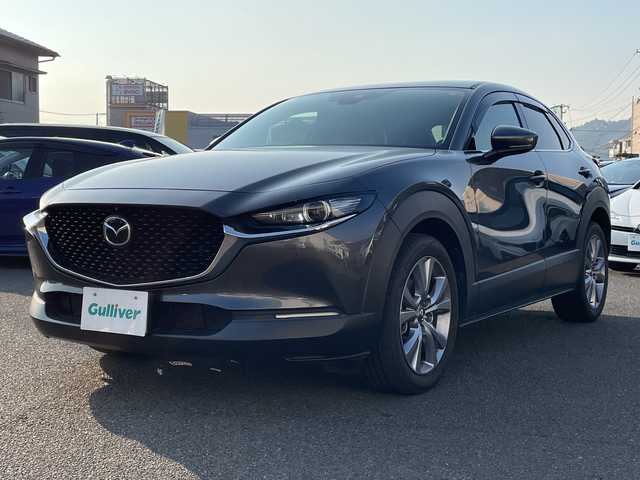 マツダ ＣＸ－３０ 20S Lパッケージ 広島県 2022(令4)年 5.5万km マシーングレープレミアムM BOSEプレミアムサウンド/ワンオーナー/純正メーカーOPナビ/【CD/DVD/フルセグTV/Bluetooth】/全方位モニター/ビルトインETC/レザーシート/シートヒーター(D/N)/パワーシート/パドルシフト/ステアリングヒーター/レーダークルーズコントロール/前後コーナーセンサー/車線逸脱警報/LEDヘッドライト/オートライト/オートマチックハイビーム/オートワイパー/プッシュスタート/スマートキー