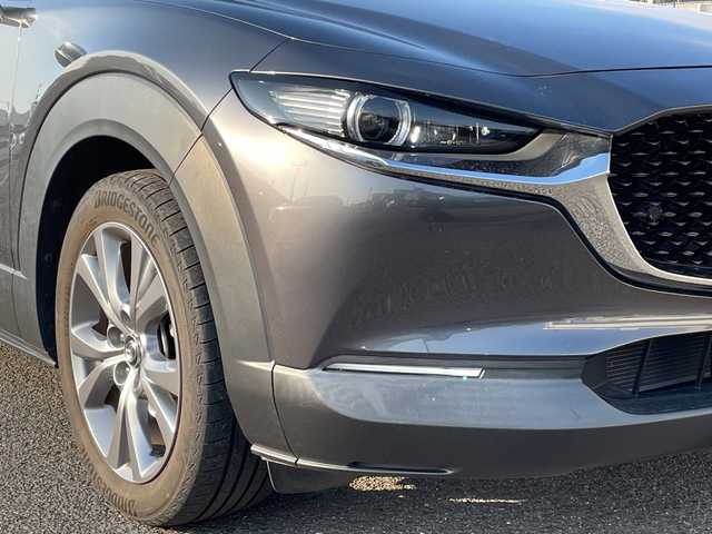 マツダ ＣＸ－３０ 20S Lパッケージ 広島県 2022(令4)年 5.5万km マシーングレープレミアムM BOSEプレミアムサウンド/ワンオーナー/純正メーカーOPナビ/【CD/DVD/フルセグTV/Bluetooth】/全方位モニター/ビルトインETC/レザーシート/シートヒーター(D/N)/パワーシート/パドルシフト/ステアリングヒーター/レーダークルーズコントロール/前後コーナーセンサー/車線逸脱警報/LEDヘッドライト/オートライト/オートマチックハイビーム/オートワイパー/プッシュスタート/スマートキー