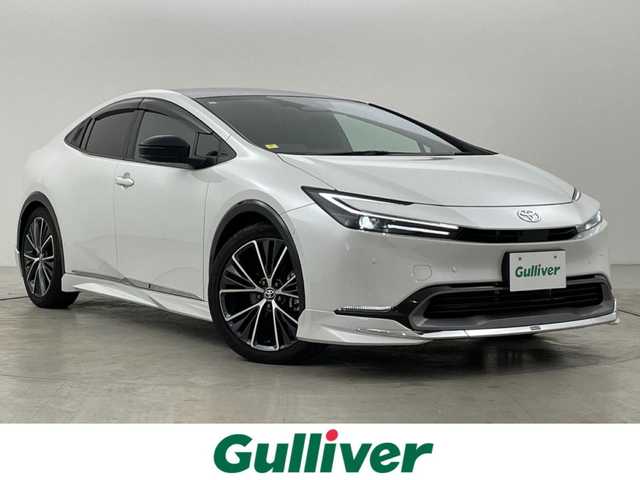 トヨタ プリウス Z 福岡県 2023(令5)年 1.6万km プラチナホワイトパールマイカ ワンオーナー　/モデリスタエアロ　/サンルーフ　/純正ＤＡナビ　/全方位カメラ　/ナビ連動ドラレコ　/ＥＴＣ２．０　/ＡＣＣ　/コーナーセンサー　/ＰＣＳ　/ＬＤＡ　/ＢＳＭ　/ＰＫＳＢ　/パーキングアシスト　/電動リアゲート