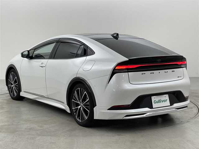 トヨタ プリウス Z 福岡県 2023(令5)年 1.6万km プラチナホワイトパールマイカ ワンオーナー　/モデリスタエアロ　/サンルーフ　/純正ＤＡナビ　/全方位カメラ　/ナビ連動ドラレコ　/ＥＴＣ２．０　/ＡＣＣ　/コーナーセンサー　/ＰＣＳ　/ＬＤＡ　/ＢＳＭ　/ＰＫＳＢ　/パーキングアシスト　/電動リアゲート