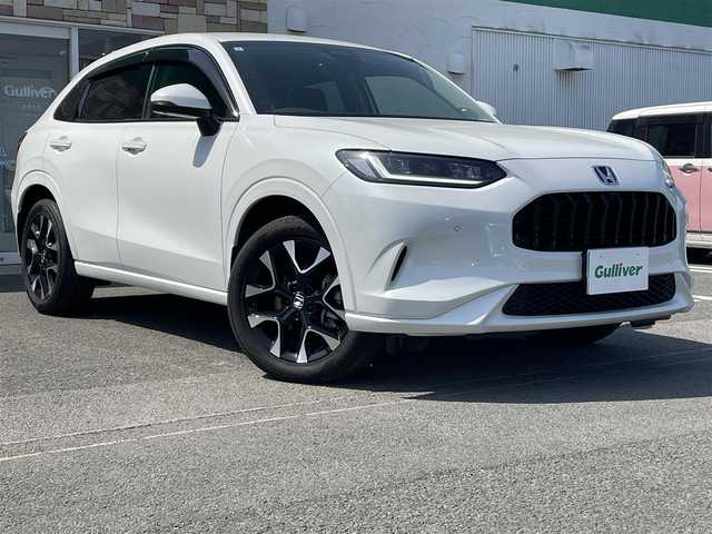 ホンダ ＺＲ－Ｖ ハイブリッド e:HEV Z 徳島県 2023(令5)年 1.1万km プラチナホワイトパール 純正ナビ/追従付きクルーズコントロール/衝突被害軽減ブレーキ/LEDヘッドライト/スマートキー/オートライト/レーンキープアシスト/前後コーナーセンサー/全方位カメラ/BOSEプレミアムサウンドシステム/パワーシート/レザーシート/シートヒーター/デジタルグラフィックメーター/ワイヤレス充電器/オート格納ドアミラー/純正アルミホイール/純正フロアマット