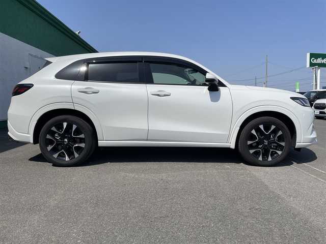 ホンダ ＺＲ－Ｖ ハイブリッド e:HEV Z 徳島県 2023(令5)年 1.1万km プラチナホワイトパール 純正ナビ/追従付きクルーズコントロール/衝突被害軽減ブレーキ/LEDヘッドライト/スマートキー/オートライト/レーンキープアシスト/前後コーナーセンサー/全方位カメラ/BOSEプレミアムサウンドシステム/パワーシート/レザーシート/シートヒーター/デジタルグラフィックメーター/ワイヤレス充電器/オート格納ドアミラー/純正アルミホイール/純正フロアマット