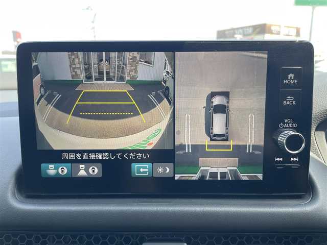 ホンダ ＺＲ－Ｖ ハイブリッド e:HEV Z 徳島県 2023(令5)年 1.1万km プラチナホワイトパール 純正ナビ/追従付きクルーズコントロール/衝突被害軽減ブレーキ/LEDヘッドライト/スマートキー/オートライト/レーンキープアシスト/前後コーナーセンサー/全方位カメラ/BOSEプレミアムサウンドシステム/パワーシート/レザーシート/シートヒーター/デジタルグラフィックメーター/ワイヤレス充電器/オート格納ドアミラー/純正アルミホイール/純正フロアマット