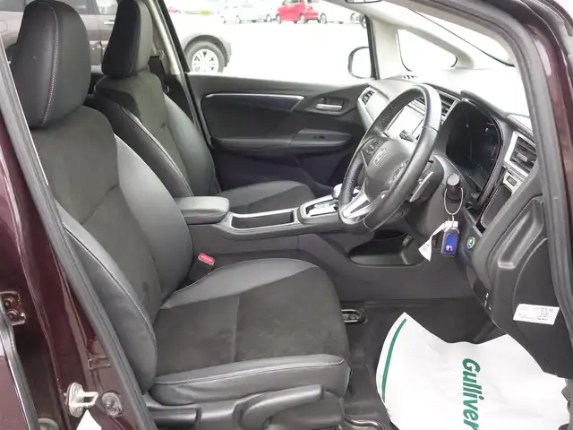 ホンダ シャトル ハイブリッド X 山形県 2015(平27)年 7.7万km ミスティックガーネットP 衝突被害軽減システム/純正メモリナビ/　　【CD DVD BT ワンセグ USB AUX】/バックカメラ/クルーズコントロール/LEDオートヘッドライト/ハーフレザーシート/ドライブレコーダー/アイドリングストップ/ステアリングスイッチ/パドルシフト/電動格納ウィンカーミラー/フォグランプ/スマートキー×2