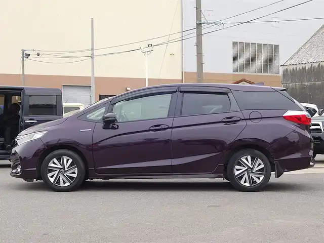 ホンダ シャトル ハイブリッド X 山形県 2015(平27)年 7.7万km ミスティックガーネットP 衝突被害軽減システム/純正メモリナビ/　　【CD DVD BT ワンセグ USB AUX】/バックカメラ/クルーズコントロール/LEDオートヘッドライト/ハーフレザーシート/ドライブレコーダー/アイドリングストップ/ステアリングスイッチ/パドルシフト/電動格納ウィンカーミラー/フォグランプ/スマートキー×2